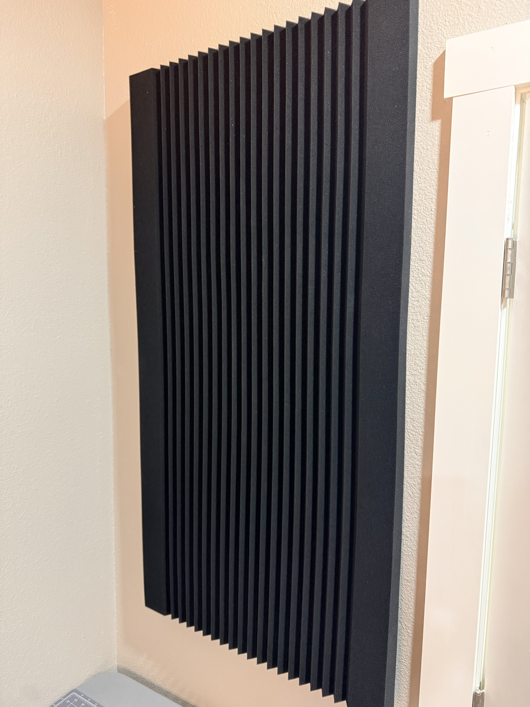 Black Foam Acoustic panel mounted on wall